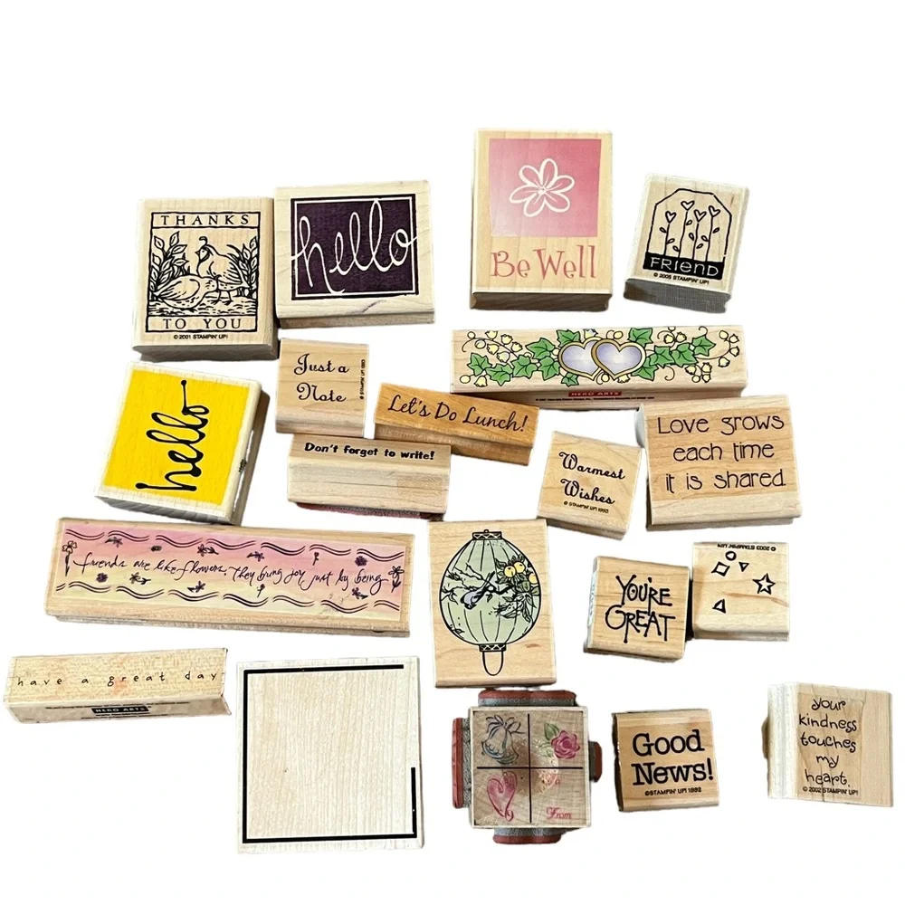 Lot of 20 rubber stamps. Most of the stamps are brand new.